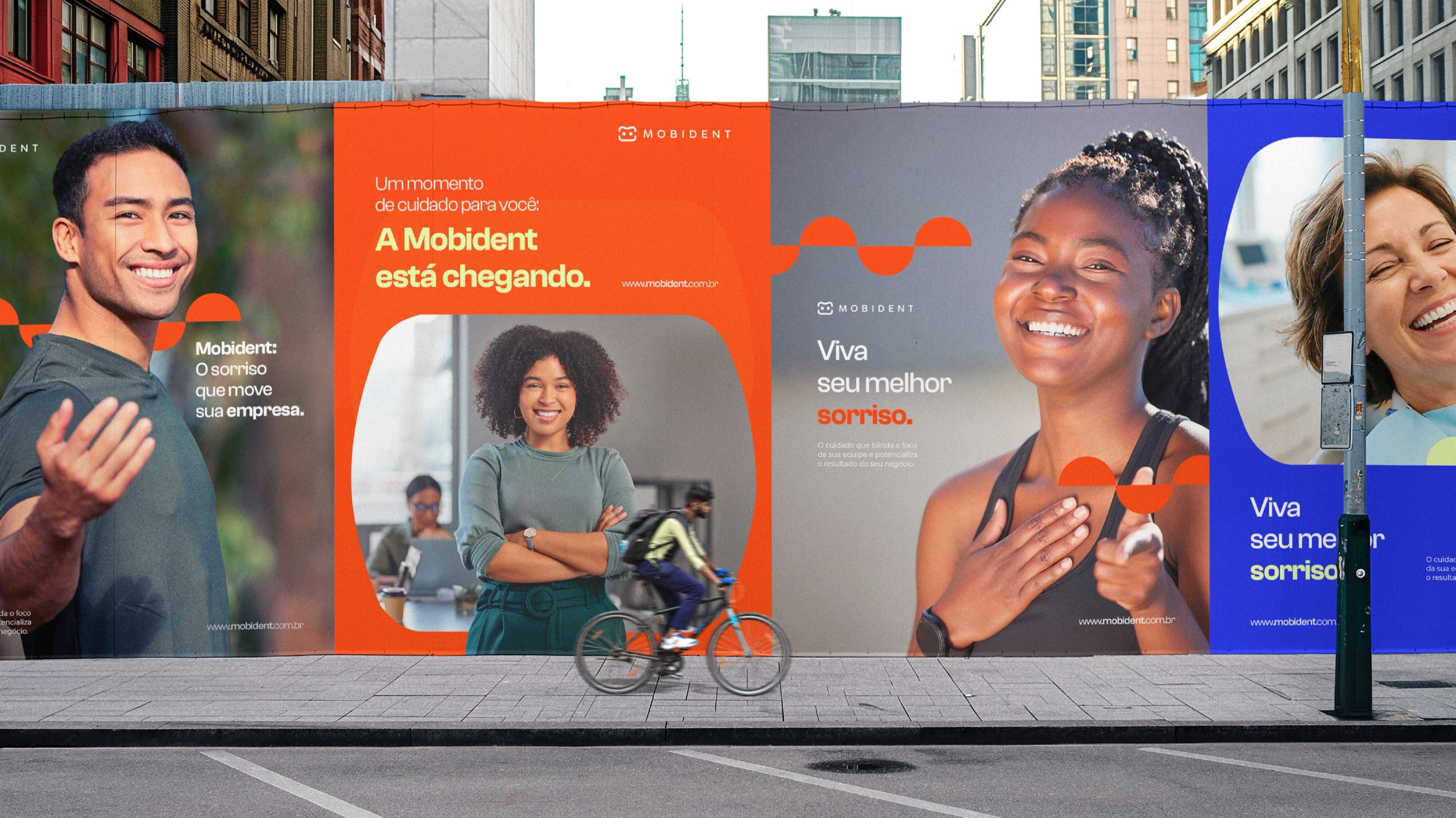 Tapume urbano com a campanha da Mobident